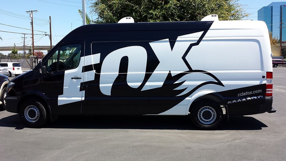 Fox Van black and white color vehicle wrap