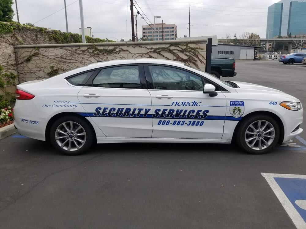 Security services vehicle wrap